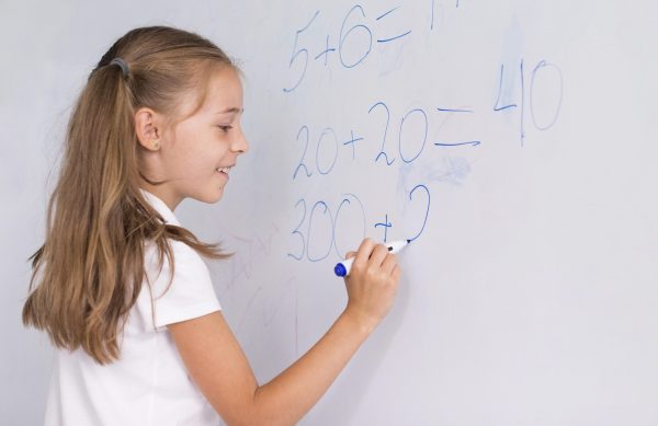 girl-doing-math-whiteboard